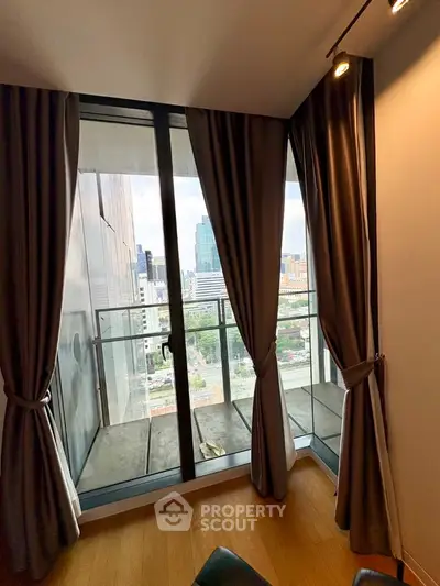 Modern apartment balcony with city view and elegant curtains