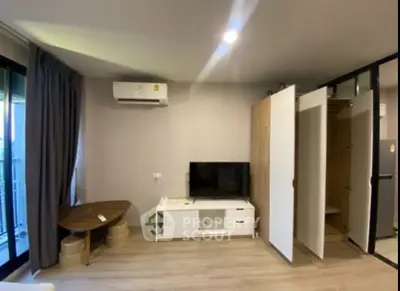 Modern living room with air conditioning and stylish furniture in a cozy apartment.