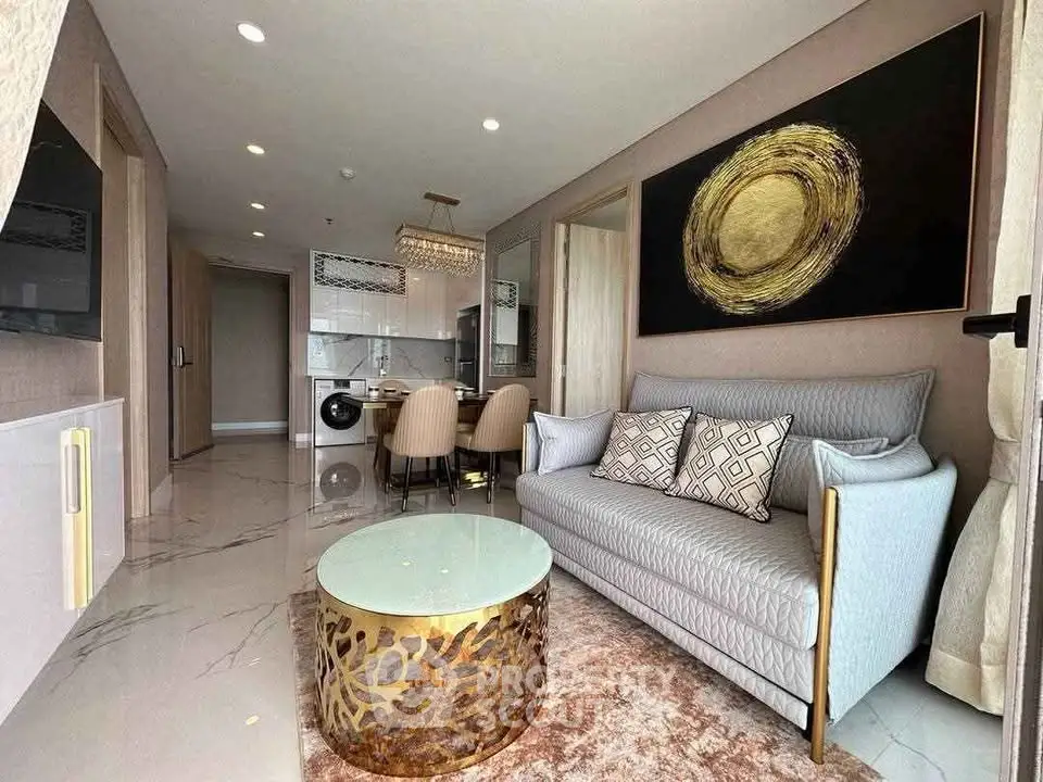Luxurious modern living room with elegant decor and open kitchen layout