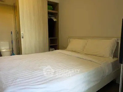 Cozy bedroom with modern design and ample storage space