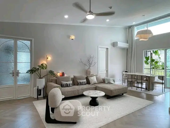 Spacious modern living room with elegant decor and natural light