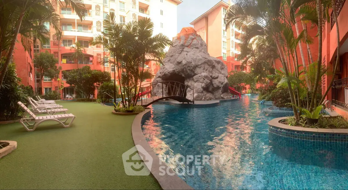 Luxurious tropical resort with stunning pool and lush greenery, perfect for relaxation and leisure.