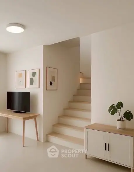 Modern minimalist living room with staircase and stylish decor