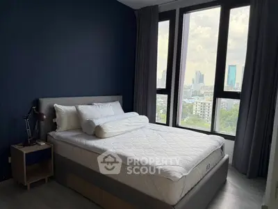 Modern bedroom with city view and stylish decor