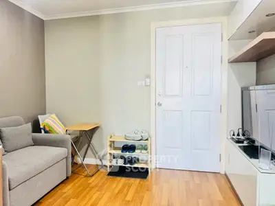 Cozy living room with modern decor and wooden flooring