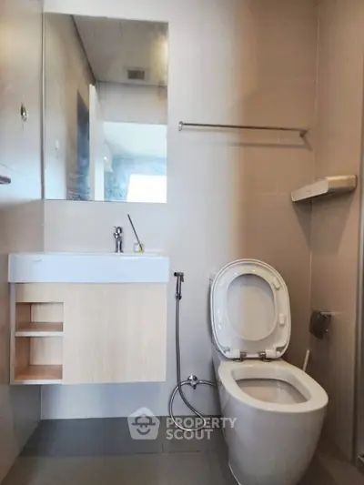 Modern bathroom with sleek fixtures and neutral tones