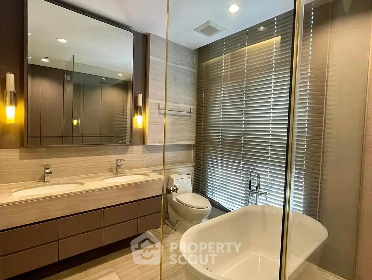 Luxurious bathroom with modern fixtures and elegant bathtub design.