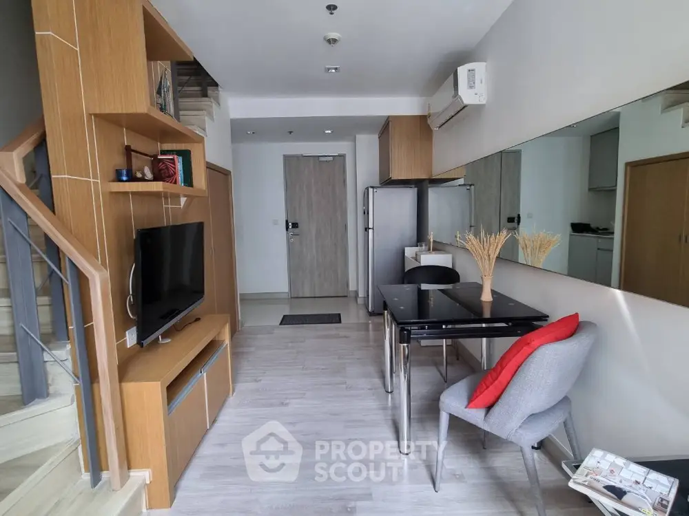 Modern living room with sleek furniture and open layout in a stylish apartment