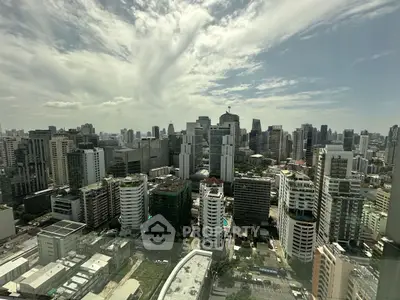 Stunning cityscape view from high-rise building showcasing urban skyline and architecture.