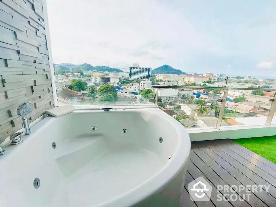 Luxurious balcony with jacuzzi and stunning city view