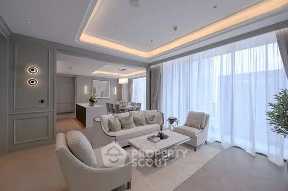 Luxurious modern living room with elegant decor and large windows