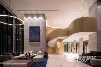 Luxurious modern lobby with elegant spiral staircase and stylish seating area