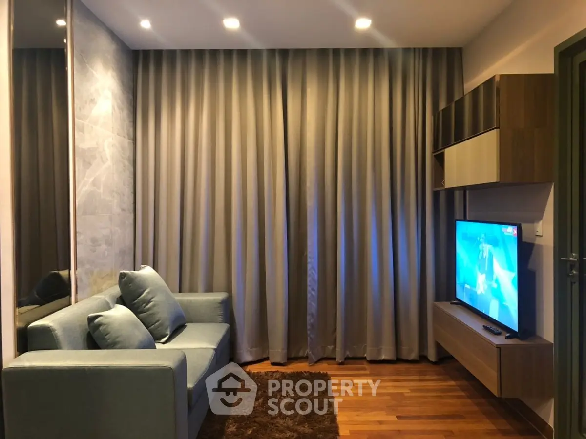 Cozy living room with modern decor and entertainment setup