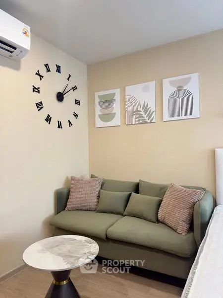 Cozy living room with modern decor and stylish wall art
