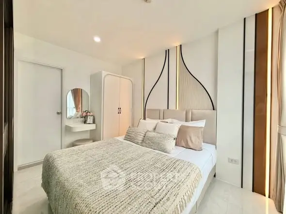 Modern bedroom with stylish decor and cozy ambiance