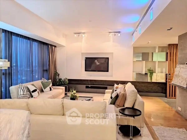 Luxurious modern living room with elegant decor and ambient lighting