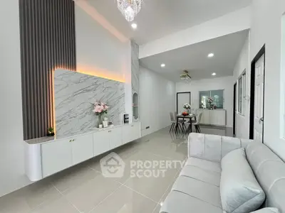 Modern living room with elegant decor and spacious dining area