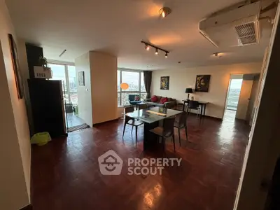 Spacious living room with city view and modern decor