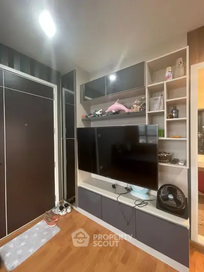 Modern living room with sleek TV unit and stylish decor