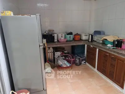 Spacious kitchen with modern appliances and ample storage space