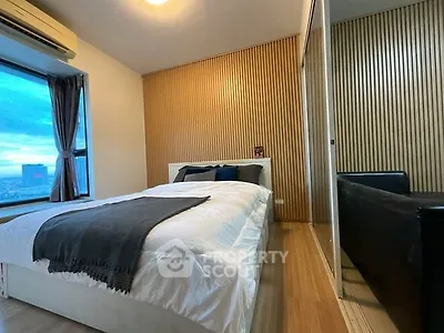 Modern bedroom with city view and stylish wood paneling