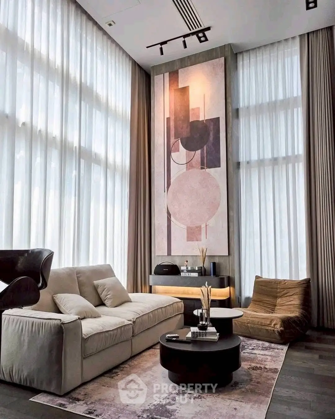 Luxurious modern living room with high ceilings and elegant decor