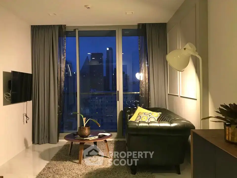 Stylish living room with city view, modern decor, and cozy ambiance.