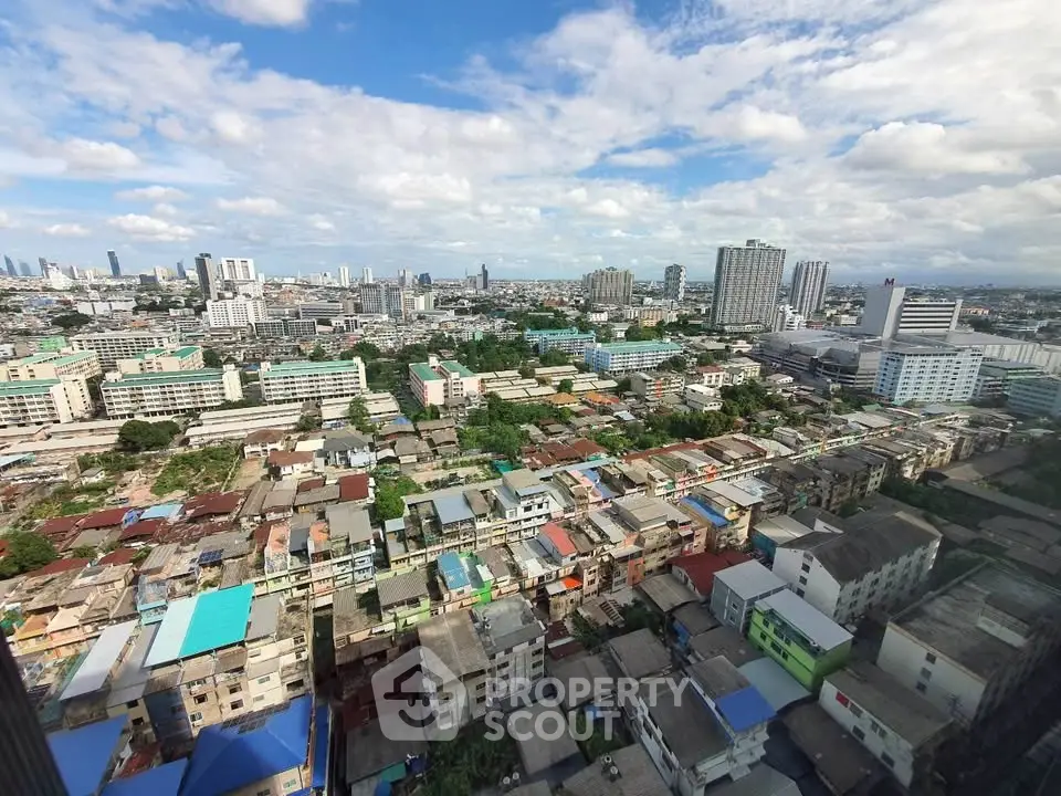Stunning cityscape view showcasing diverse urban architecture and skyline under a vibrant blue sky.