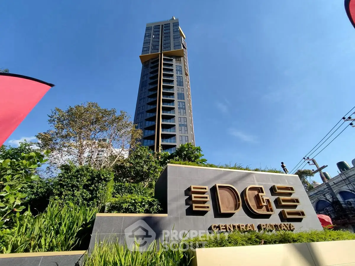 Stunning modern high-rise building with lush greenery at Edge Central Pattaya.