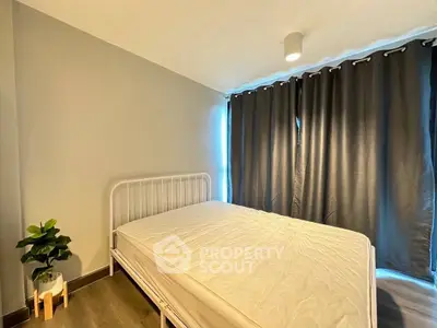 Cozy bedroom with minimalist decor and natural light