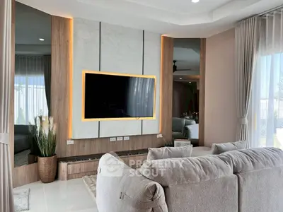 Luxurious modern living room with stylish TV wall and plush sofa