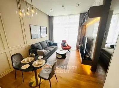 Modern living room with stylish furniture and elegant lighting in a cozy apartment.