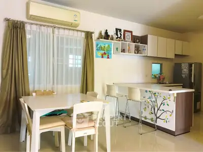 Modern kitchen and dining area with stylish decor and open layout