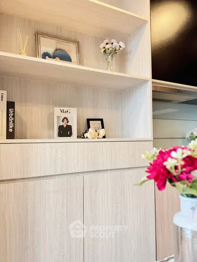 Stylish modern living room with elegant shelving and decorative accents