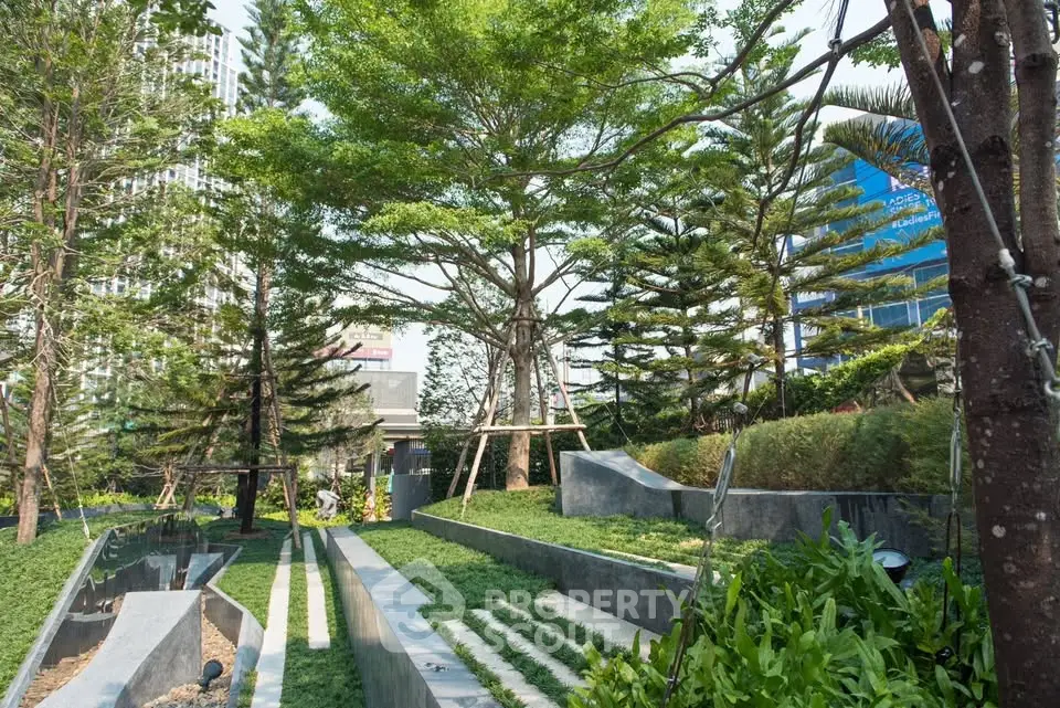 Lush landscaped garden with modern design in urban setting, perfect for relaxation and outdoor activities.