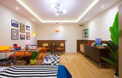 Stylish modern living room with vibrant decor and cozy seating area