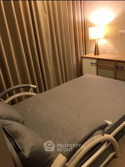 Cozy bedroom with modern furniture and warm lighting