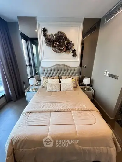 Luxurious bedroom with elegant decor and plush bedding in modern apartment