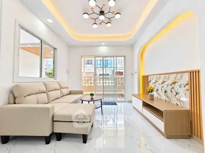 Luxurious modern living room with elegant lighting and marble accents