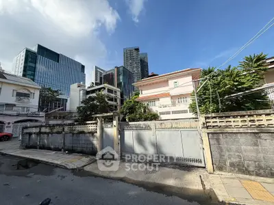Charming urban residential area with modern high-rise buildings and classic houses