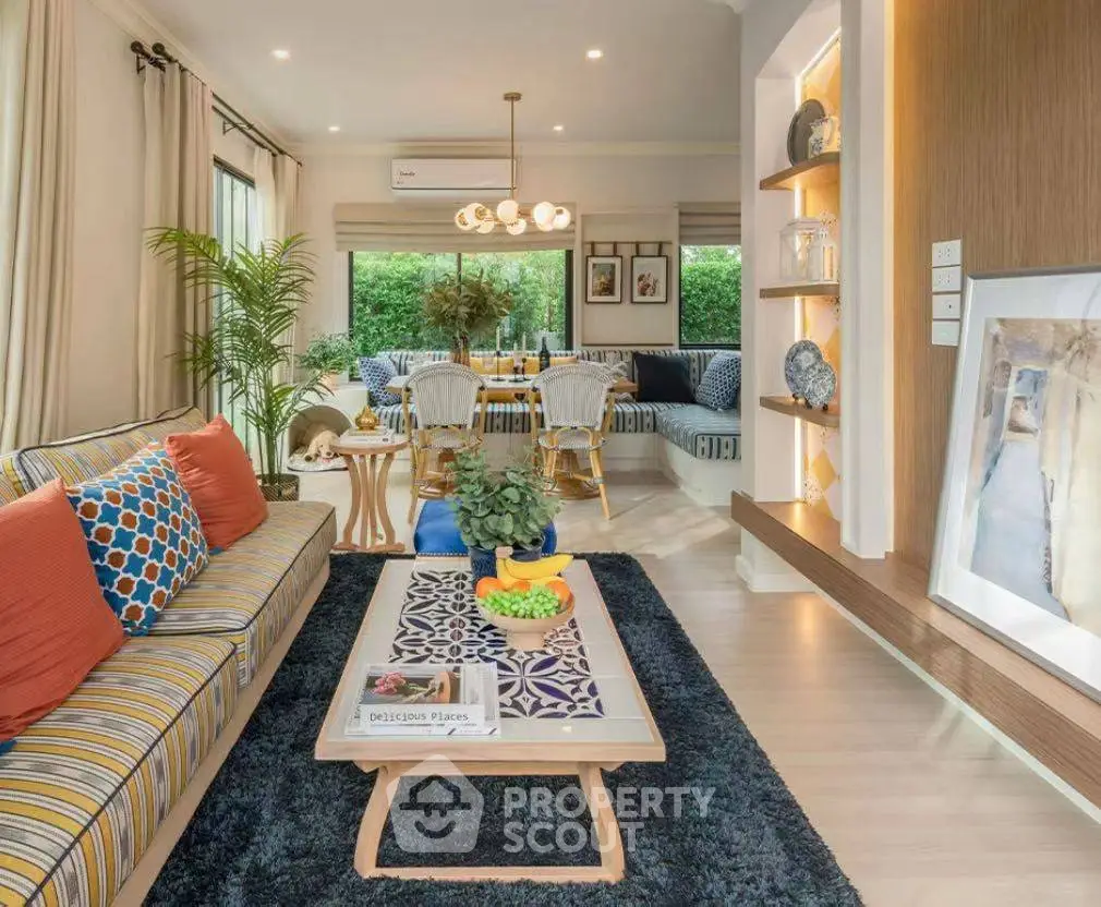 Spacious and stylish living room with modern decor and natural light