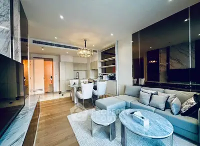 Luxurious modern living room with elegant decor and open kitchen layout