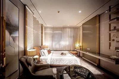 Luxurious modern bedroom with elegant decor and ambient lighting