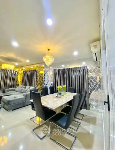 Luxurious living room with elegant dining area and modern decor