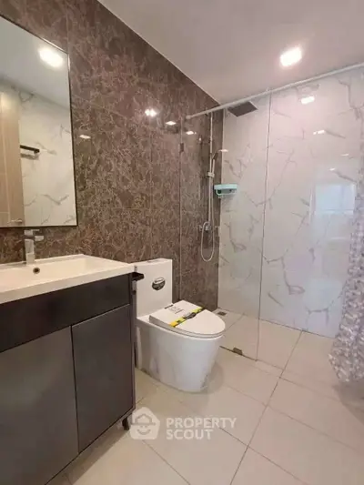 Modern bathroom with sleek design and marble accents