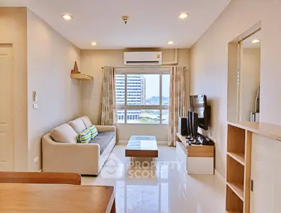 Modern living room with large window and stylish furniture in a high-rise apartment.