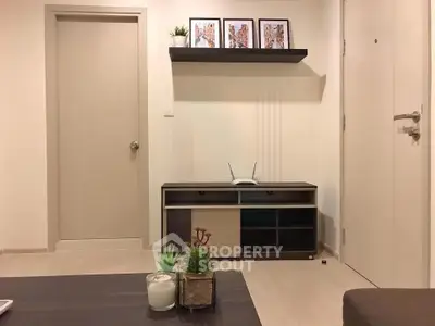 Modern living room with minimalist decor and stylish shelving unit