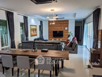 Spacious modern living room with elegant dining area and stylish decor