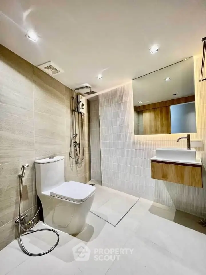 Modern bathroom with sleek fixtures and contemporary design.