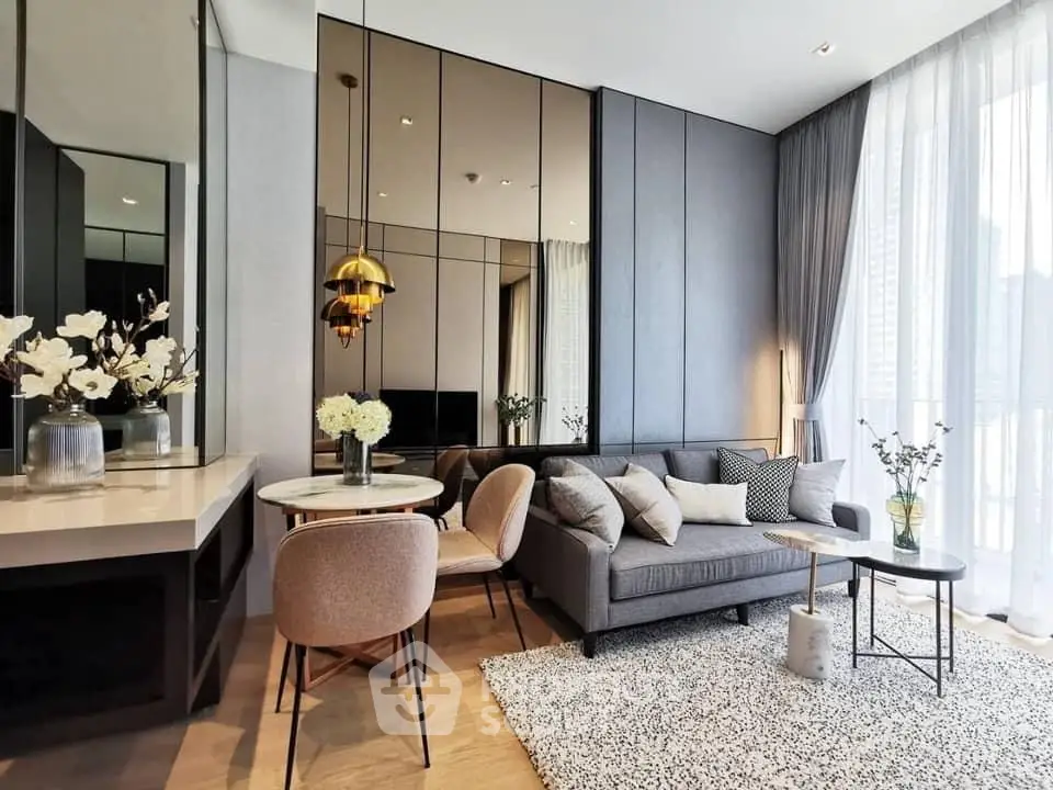 Modern living room with stylish decor and floor-to-ceiling windows